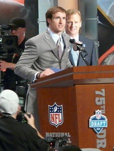 Drew Brees announces the Saints Draft Pick at the NFL 2010 Draft Photo by Marianne O'Leary. This file is licensed under the Creative Commons Attribution 2.0 Generic license.